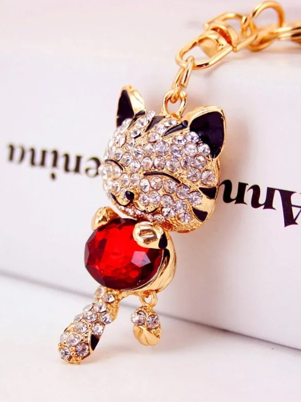 Gold-Tone Crystal with Red Gem Keychain.